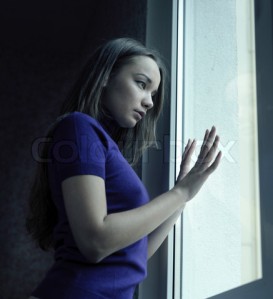 Woman near window
